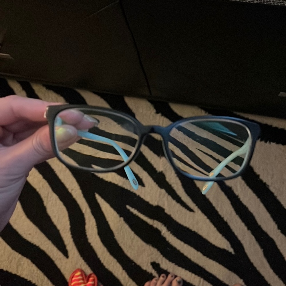 Tiffany&Co beautiful frames have Tiffany and Co logo and a lock symbol on side
